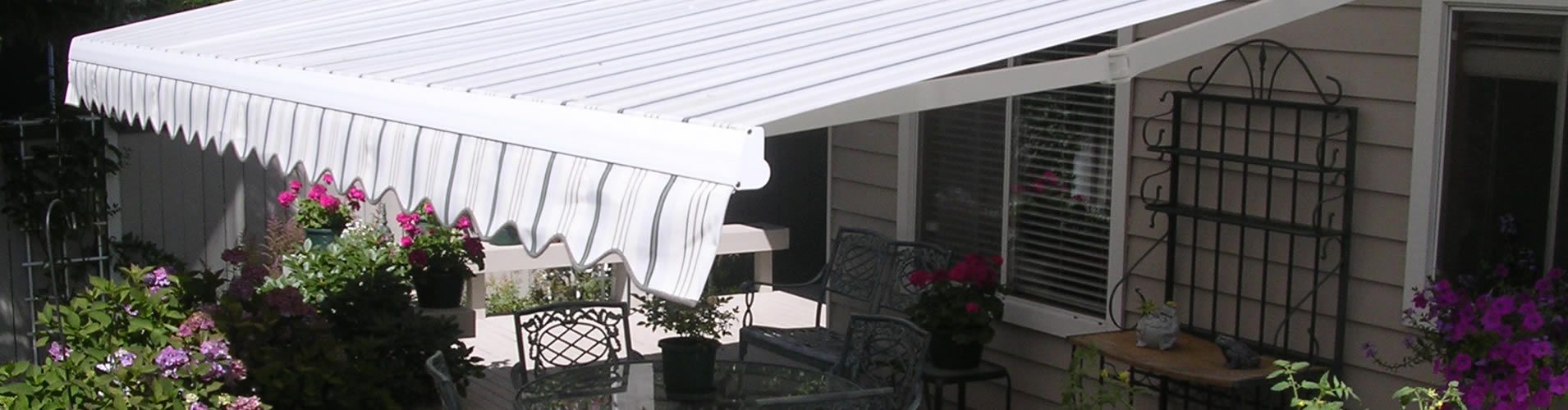 Palm Beach home save energy with an awning